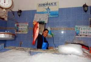 Fishmonger in Vallarta market.