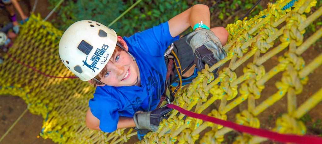 Climbing a rope ladder in Vallarta, Mexico