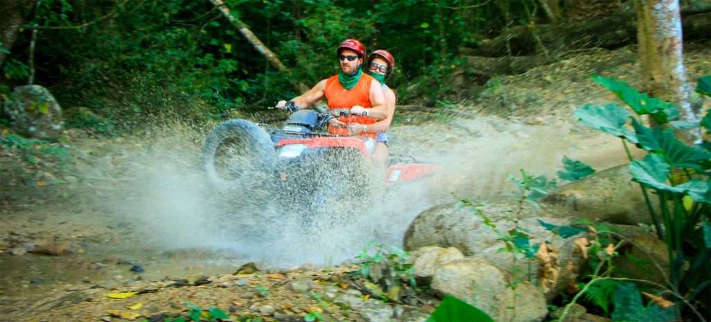 ATV crossing strem in Vallarta, Mexico.