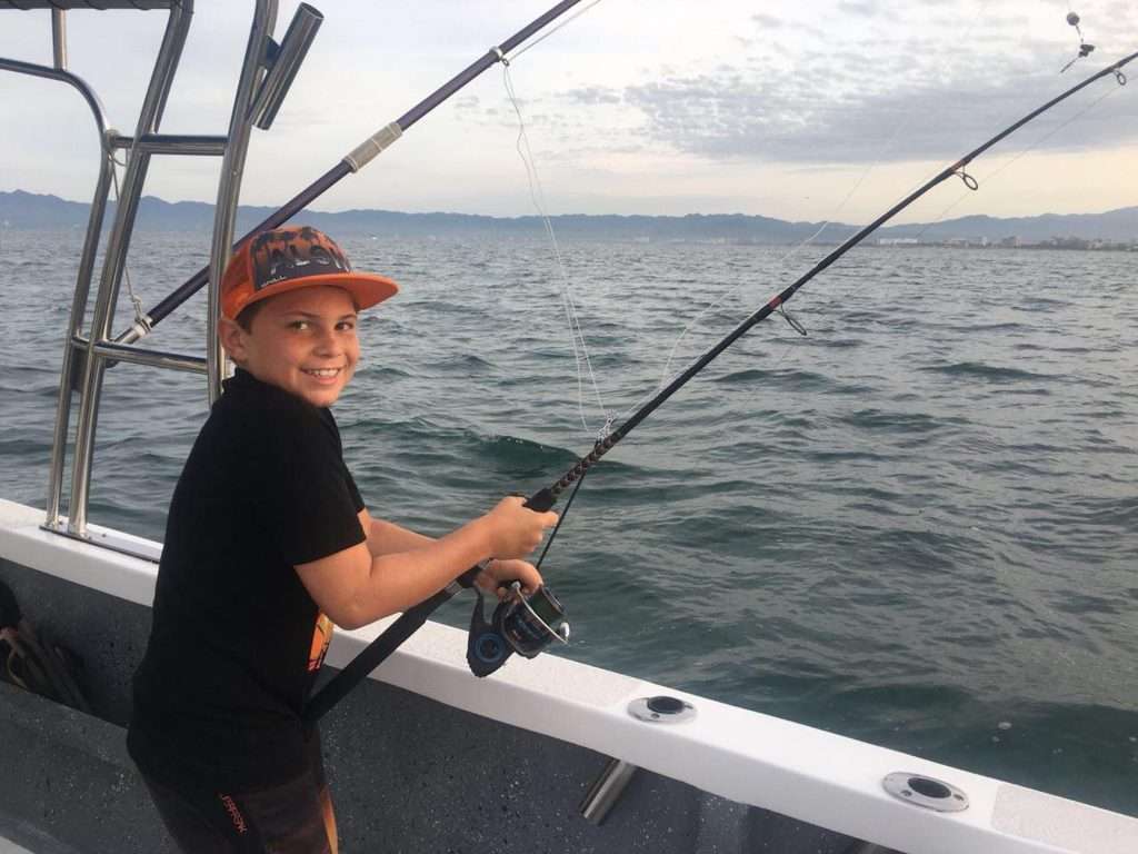 Boy fishing in Vallarta,